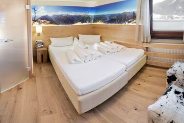 Doppelbett im Gästehaus Oblasser